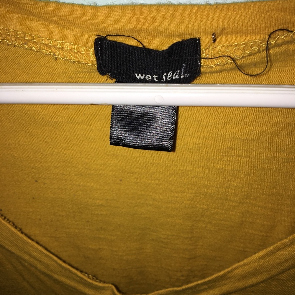 A mustard color t shirt